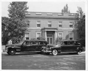 Funeral cars at Hill & Fredericks Mortuary at 13th and Brady Streets in Davenport.