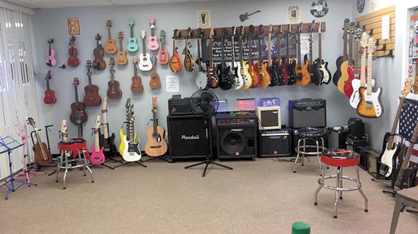 New Location for Shumaker Guitar Works in The Hilltop Campus Village