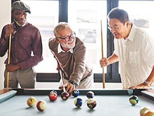 Guys playing pool